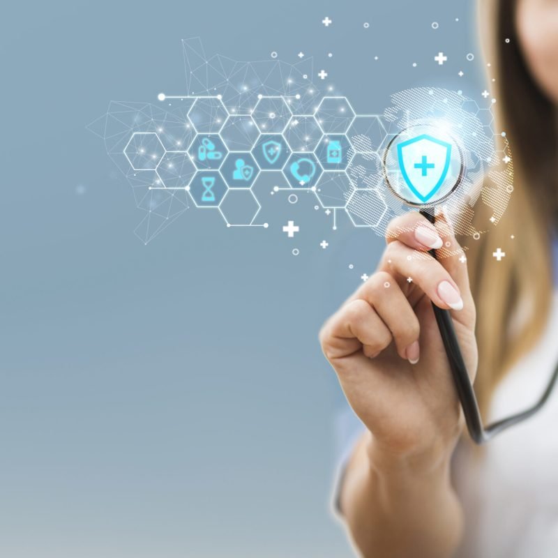 medical-banner-with-doctor-holding-stethoscope